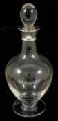 A Darlington glass decanter with silver collar, London 1996 the tear drop stopper above a silver