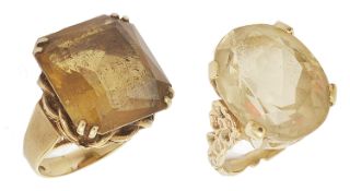 Two large contemporary yellow gem set stone gold mounted dress rings one of sherry colour and