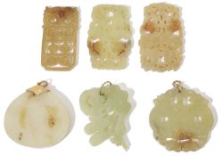 A collection of six Chinese carved hard stone pendants, 20th Century one white of globular form