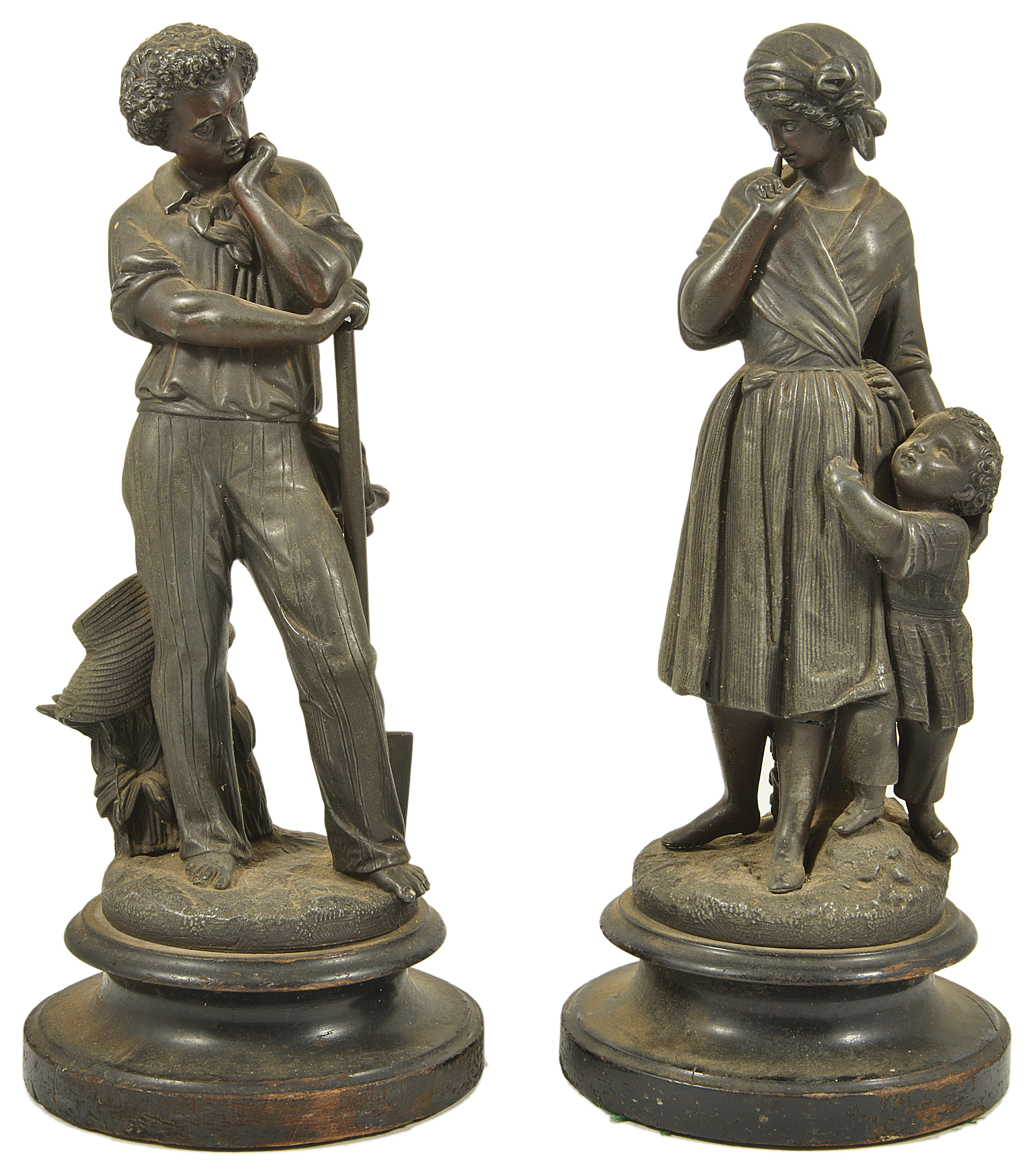 A pair of spelter figurines, 20th century modelled as a lady with a boy at her side and the other as