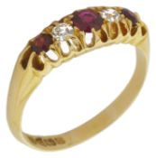 An Edwardian ruby and diamond set gypsy ring the 18ct gold mount marked for Chester 1915, set with a