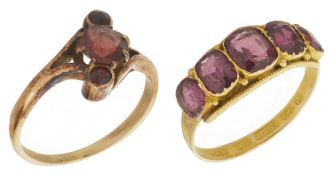 An attractive Victorian five stone almandine garnet ring the 15ct gold mount with thread twist