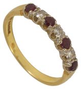 A ruby and diamond seven stone half eternity ring 18ct gold mount Size Q/RCondition: wear to both