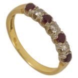 A ruby and diamond seven stone half eternity ring 18ct gold mount Size Q/RCondition: wear to both