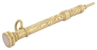 A 9ct gold Samson Mordan retracting pencil the body with leaf decoration, with agate twist off