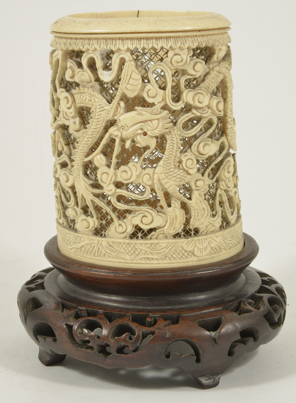 A Chinese 19th century carved ivory brush stand the cylindrical shaped holder carved with several - Image 3 of 4