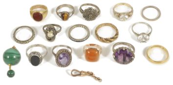 An interesting collection of antique gold rings and silver dress rings to include a yellow metal