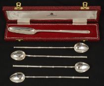 Three Asprey sterling silver cocktail accessories comprising two sets of drinking straws/spoons in
