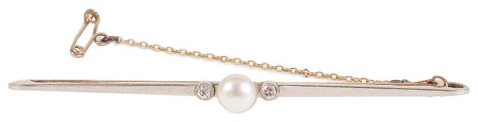 An elegant Edwardian pearl and diamond bar brooch set with a central 'button' pearl with single