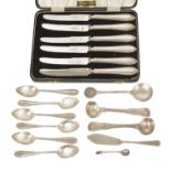 A small collection of silver flatware comprising a set of six silver handled fruit knives, five