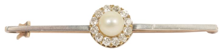 An Victorian/Edwardian circular pearl and diamond cluster brooch with central pearl with light