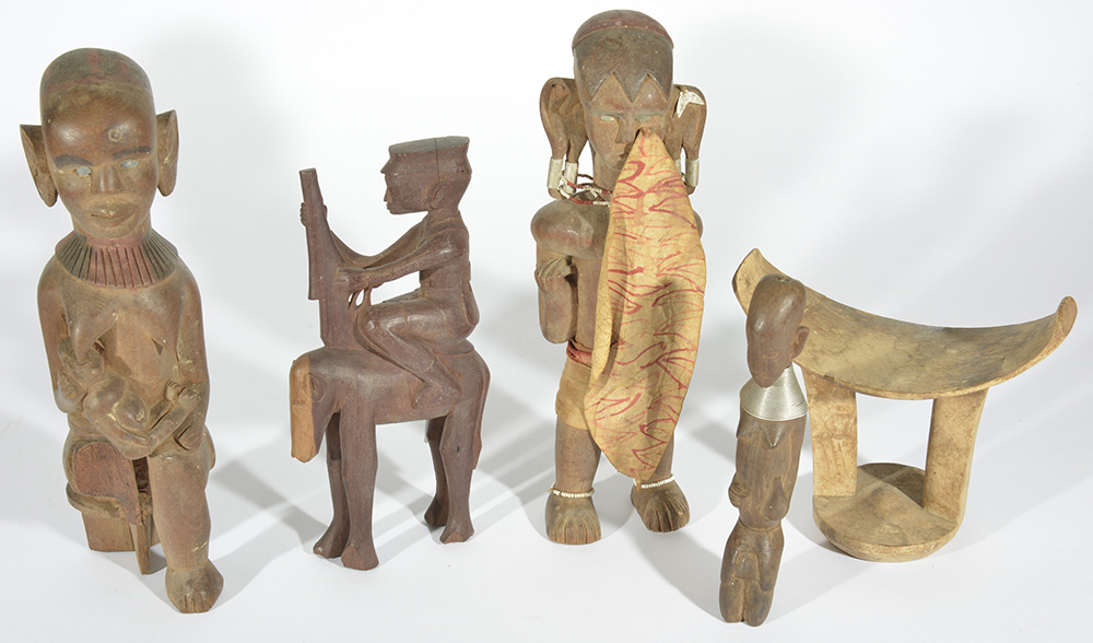 Two 20th century African tribal stools, each with dished seats upon four supports, together with a - Image 3 of 3