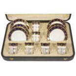 A George V suite of six Aynsley silver mounted coffee cans with saucers, Sheffield 1928 the coffee