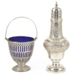 A silver pierced basket with blue glass liner, Birmingham 1928 the basket with swing handle and