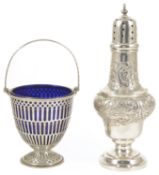 A silver pierced basket with blue glass liner, Birmingham 1928 the basket with swing handle and