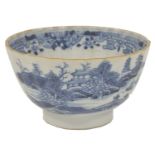 A blue and white porcelain tea bowl, 18th century, possibly Caughley, of circular gadrooned form,