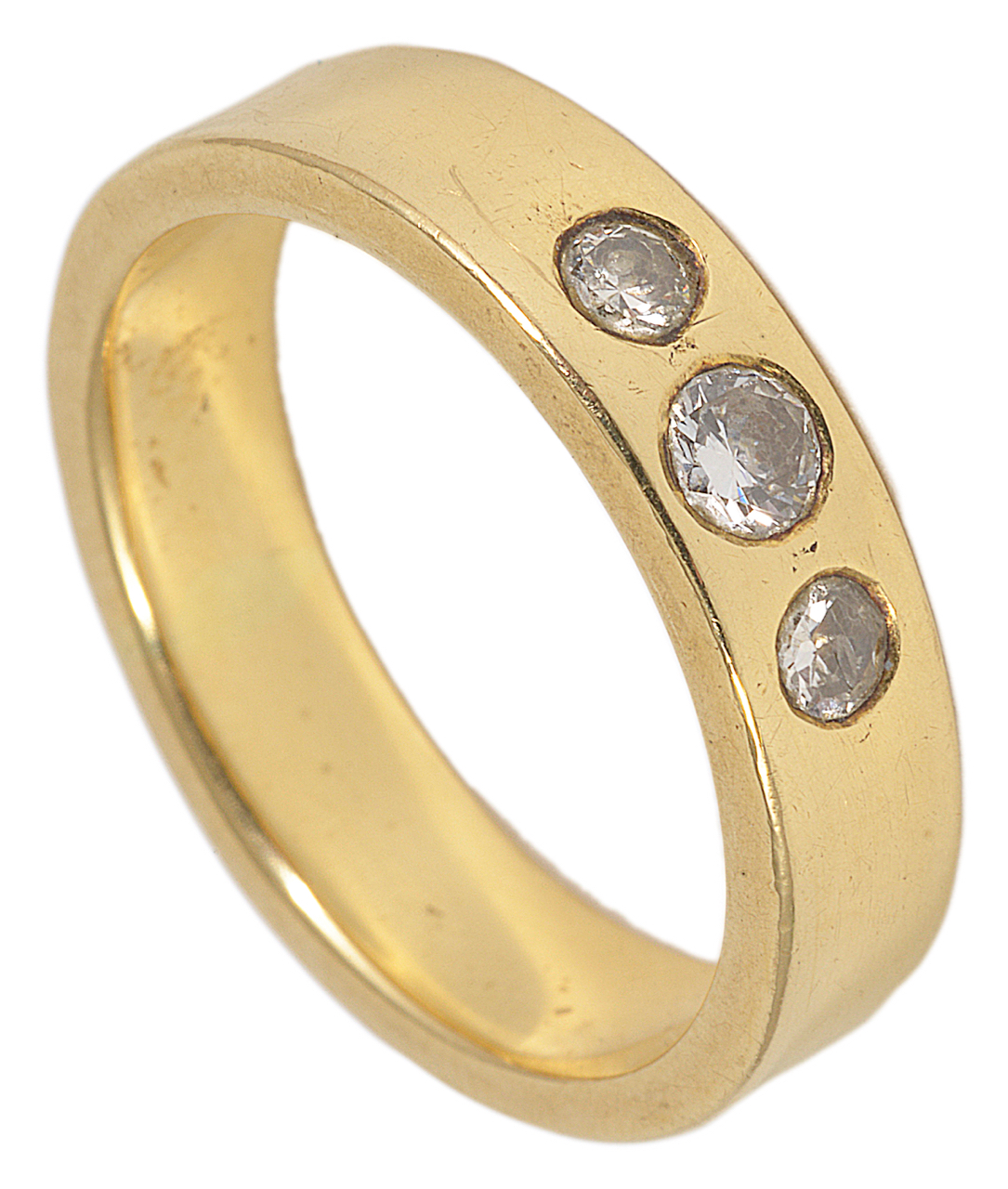 A simple heavy yellow metal band ring set with three small central diamonds the diamonds in a sunken