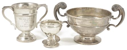 Three silver trophy cups, Sheffield 1952, Birmingham 1921 & 1932, a silver twin handled trophy