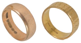 A 22ct gold wedding band and a 9ct gold wedding band the 22ct gold band with bright cut