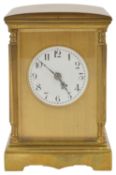 A French four glass brass carriage clock the bevelled glass flanked by turned faceted columns with