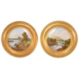 A pair of gilt framed Coalport plates, late 19th/early 20th century, of circular form with wavy edge