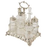 An Elkington silver plated condiment suite, comprising of the plated holder with central shaped