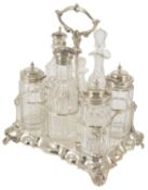 An Elkington silver plated condiment suite, comprising of the plated holder with central shaped