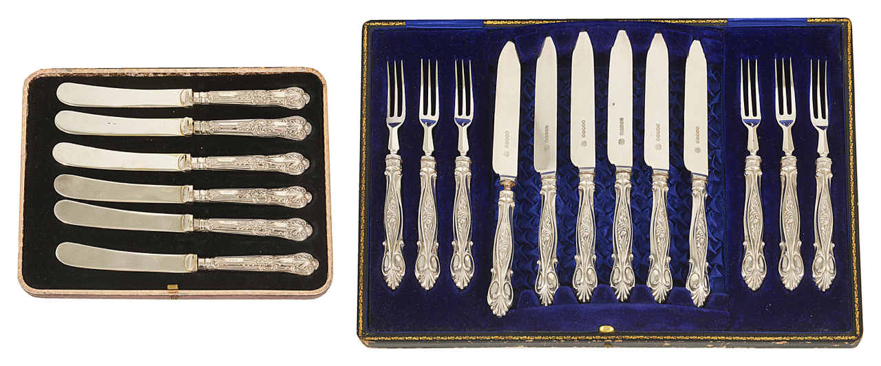 A cased set of silver handled fruit knives and forks in blue velvet lined case, the handles