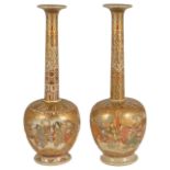 A pair of Satsuma bottle vases of unusual slender neck bottle form, circa 1900 the flaring rims