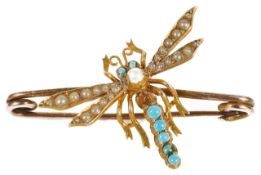 An Edwardian turquoise and pearl set dragon fly brooch the body and eyes set with turquoise and