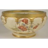 A Royal Worcester blush ivory centre bowl, dated 1896 of circular form with gilt metal rim band