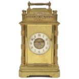 A French brass repeating carriage clock, circa 1890 with repeating movement, striking on a gong with