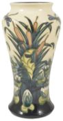 A Moorcroft pottery Lamia baluster vase, by Rachel Bishop, dated 1995 tube lined with bulrush and