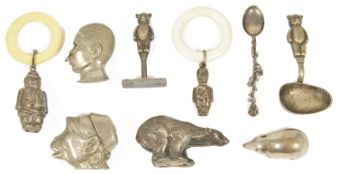 An interesting collection of novelty silver and silver plate comprising two babies teethers each