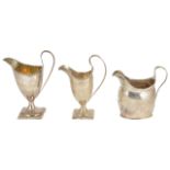 Three George III silver cream jugs, comprising of a George III silver cream jug, London 1805 with