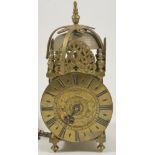 A miniature brass lantern alarm time piece the 4-inch dial signed John Hatton London, with a