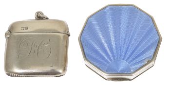 An Edwardian silver vesta case, Chester 1901 of typical form with hinged lid and striker base, front