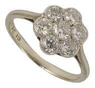 A delicate Edwardian ladies diamond daisy cluster ring 18ct white gold and platinum mount, approx.