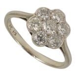 A delicate Edwardian ladies diamond daisy cluster ring 18ct white gold and platinum mount, approx.