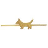 An amusing 9ct gold 'Scottie' dog brooch the Scottie naturalistically modelled and with his tail up,
