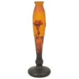 A Daum Nancy cameo glass nicotiana bud vase circa 1900 of elongated form with mottled orange acid