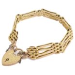 A Edwardian 9ct gold fancy four bar gate bracelet with heart padlock fastening the inner shaped bars