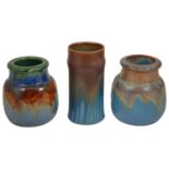 A selection of Bourne Denby pottery jars, mid 20th century comprising of a cylindrical tall ribbed