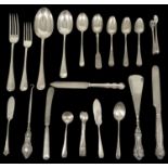 A collection of 19th and 20th century silver flatware comprising two serving spoons, two dessert