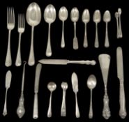 A collection of 19th and 20th century silver flatware comprising two serving spoons, two dessert