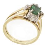 An unusual late 20th century emerald and diamond reversible cluster ring converting to a star shaped