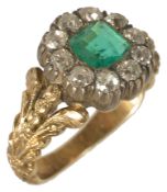 An attractive antique Georgian emerald and diamond cluster ring the central square cut emerald of