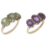 A large contemporary green tourmaline set fancy ring and an amethyst fancy ring the three stone