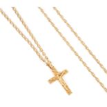 A 9ct gold crucifix pendant on gold neck chain,together with another yellow metal neck chain,