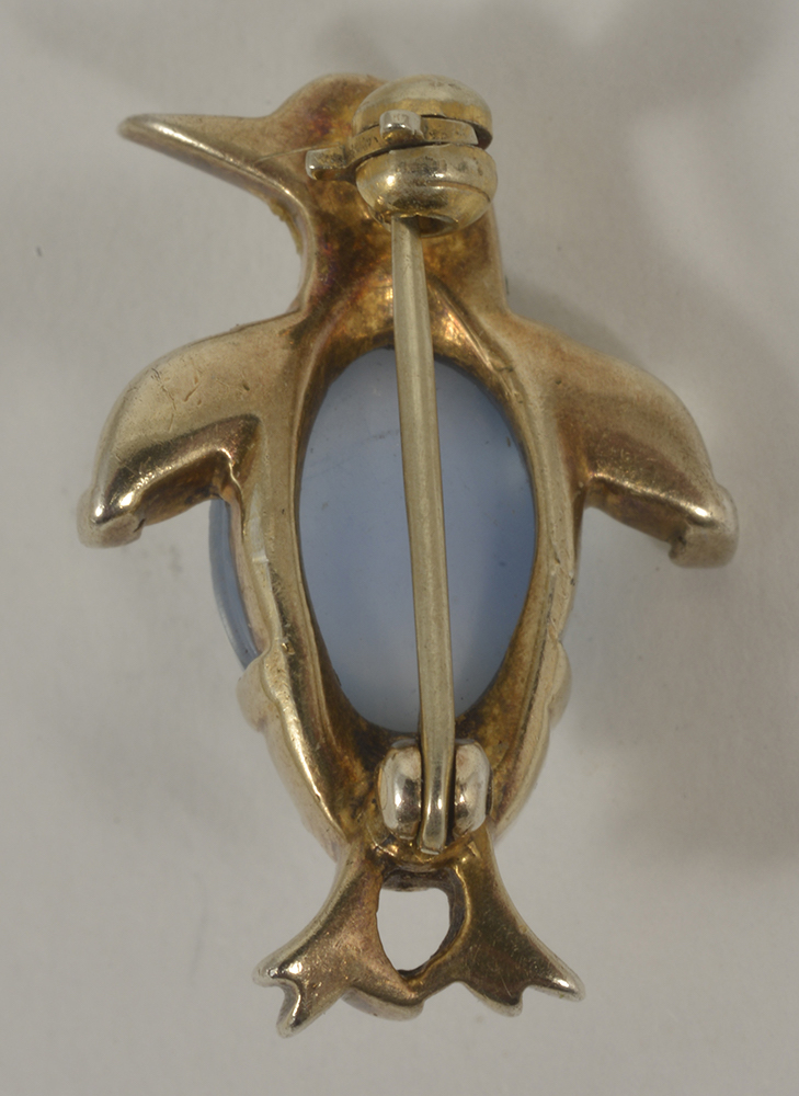 An amusing silver gilt and paste set penguin brooch, circa 1950having faux moonstone 'jelly - Image 2 of 2